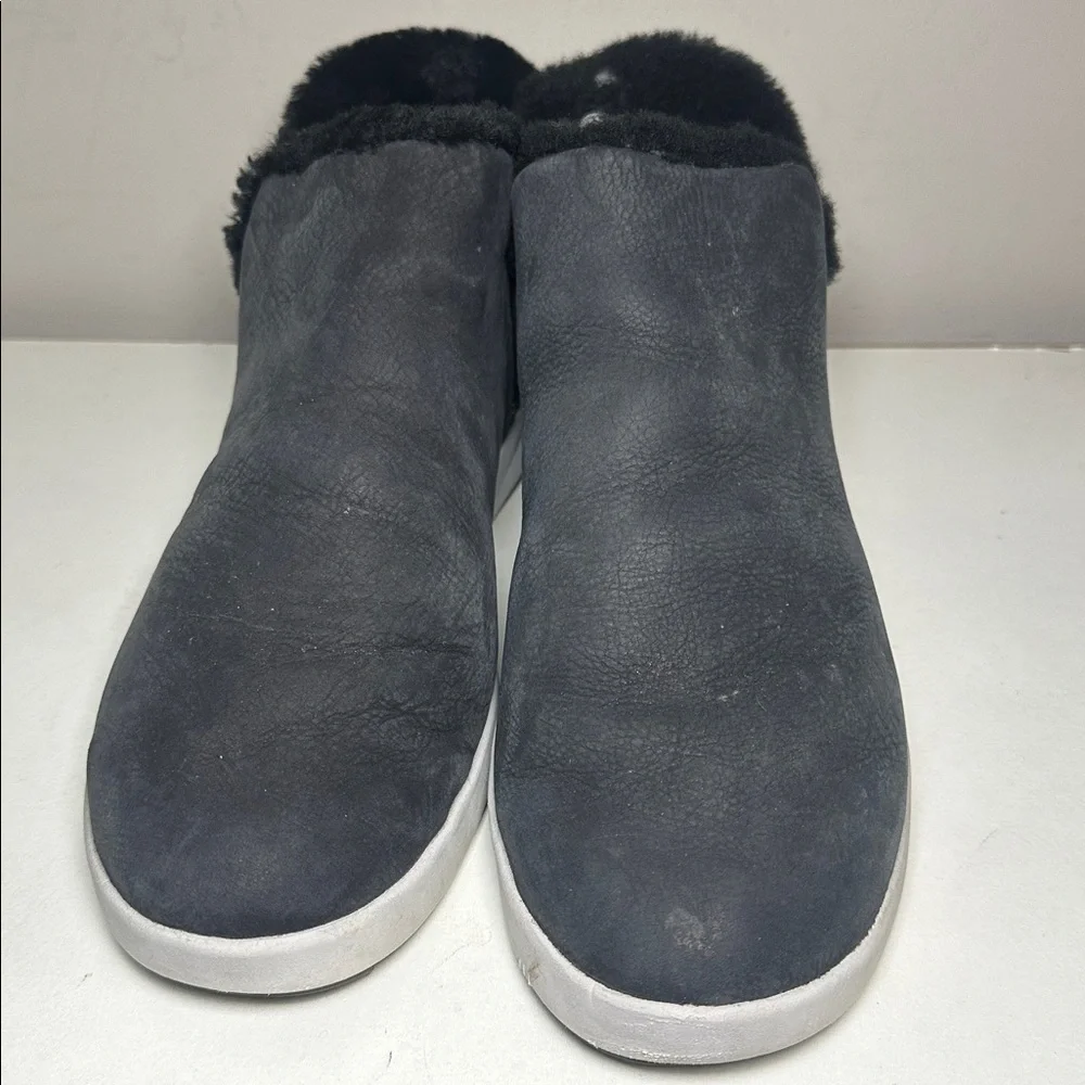 Olukai women’s Black faux fur leather Slip-On booties
